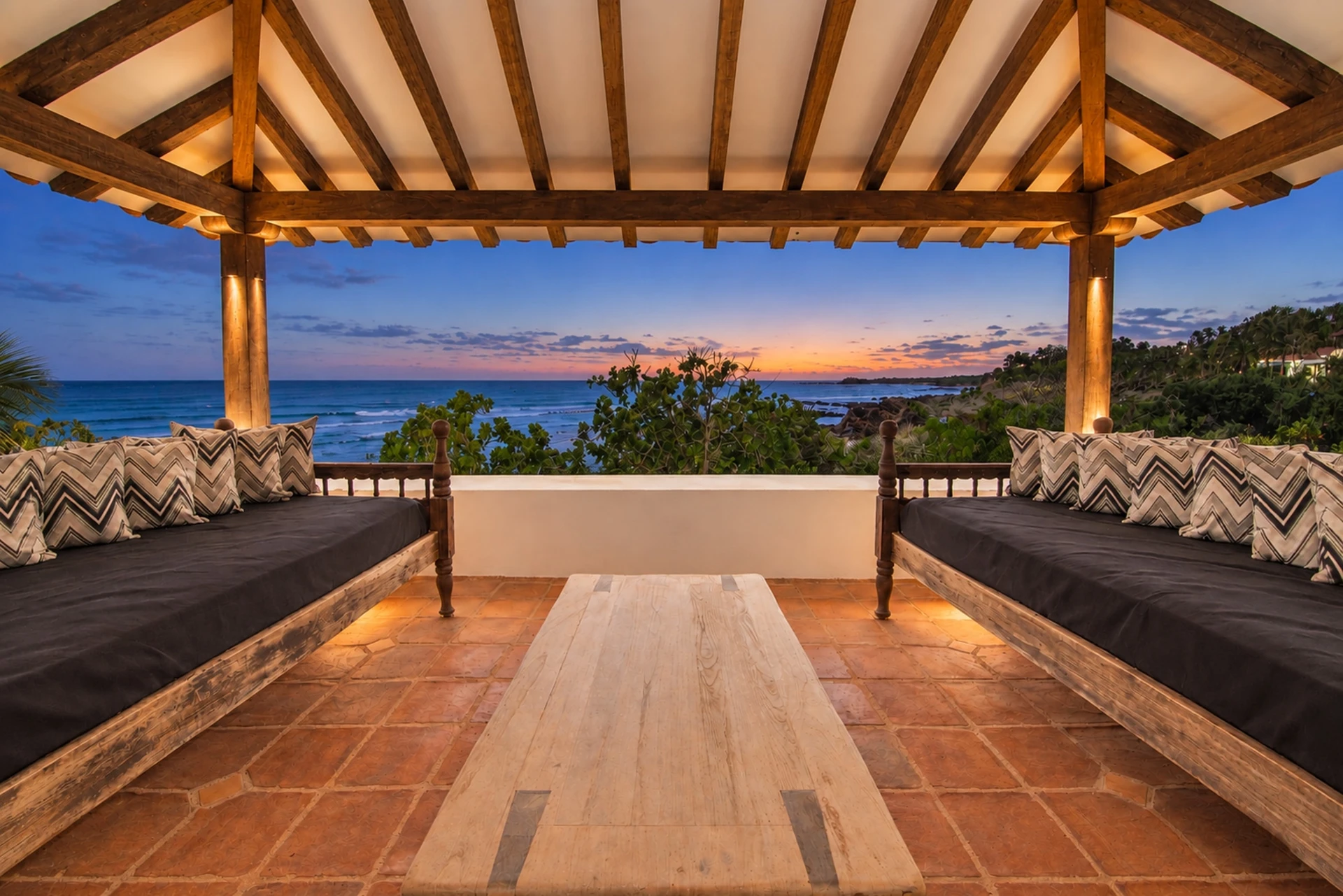 The viewing terrace at Villa Alborán at sunset, with the sea beyond
